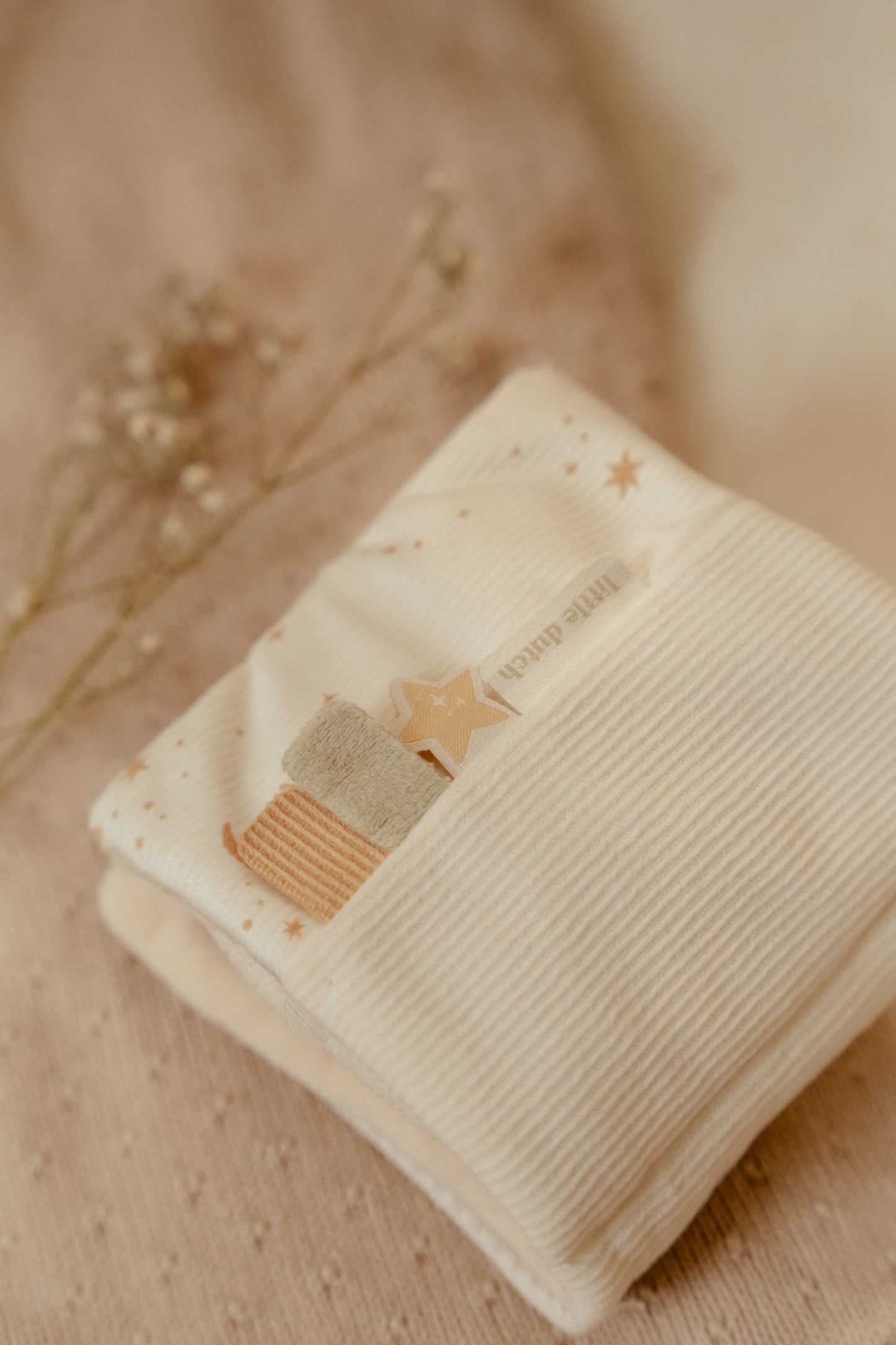 Livre d'activités en tissu pour poussette - Newborn Naturals