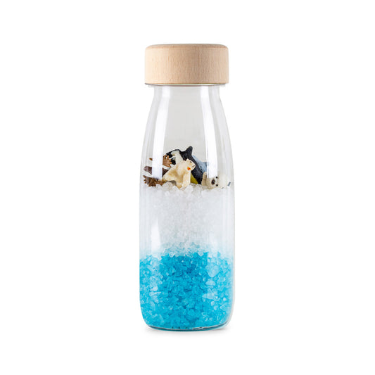 Bouteille sensorielle Ferme avec perles blanches et bleues et figurine animale