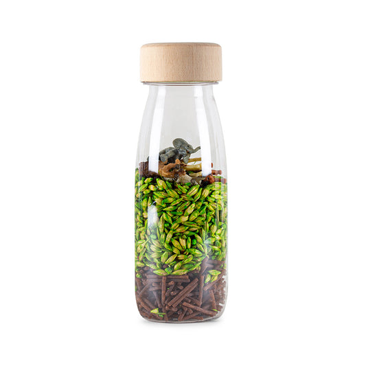 Bouteille sensorielle Jungle avec perles vertes et marron, bouchon en bois