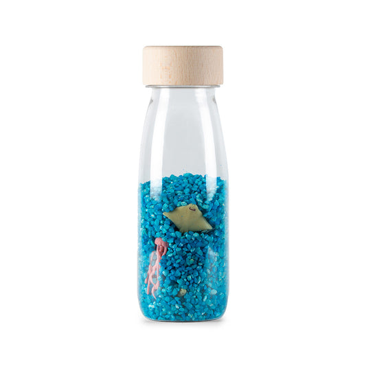 Bouteille sensorielle Mer avec perles bleues et figurine de coquillage