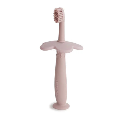 Brosse à dent de dentition en silicone rose avec poignée ergonomique pour bébé