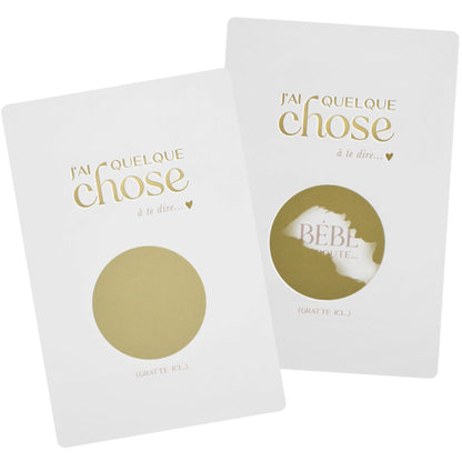 Carte à gratter blanche "J'ai quelque chose à te dire" pour annoncer l'arrivée d'un bébé