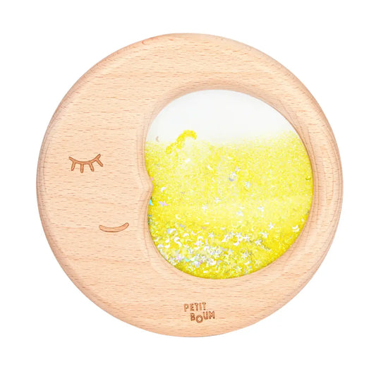 Lune sensorielle en bois avec fenêtre de liquide pailleté jaune et visage gravé endormi