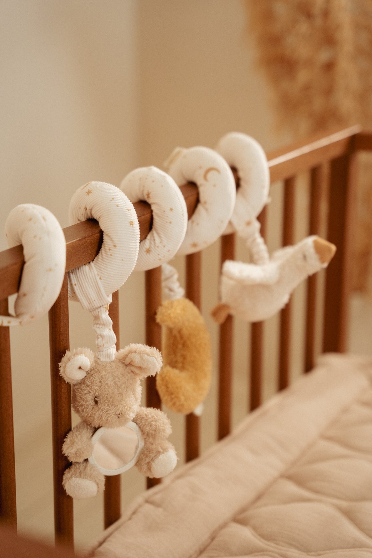 spirale d'activité sur lit bébé